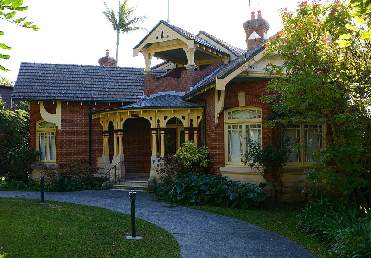 A Federation house with a curved driveway and lawn on Bancroft Avenue, Roseville